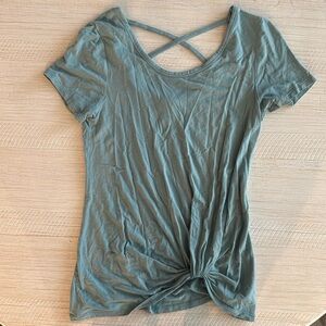 Nine Britton blue t-shirt.